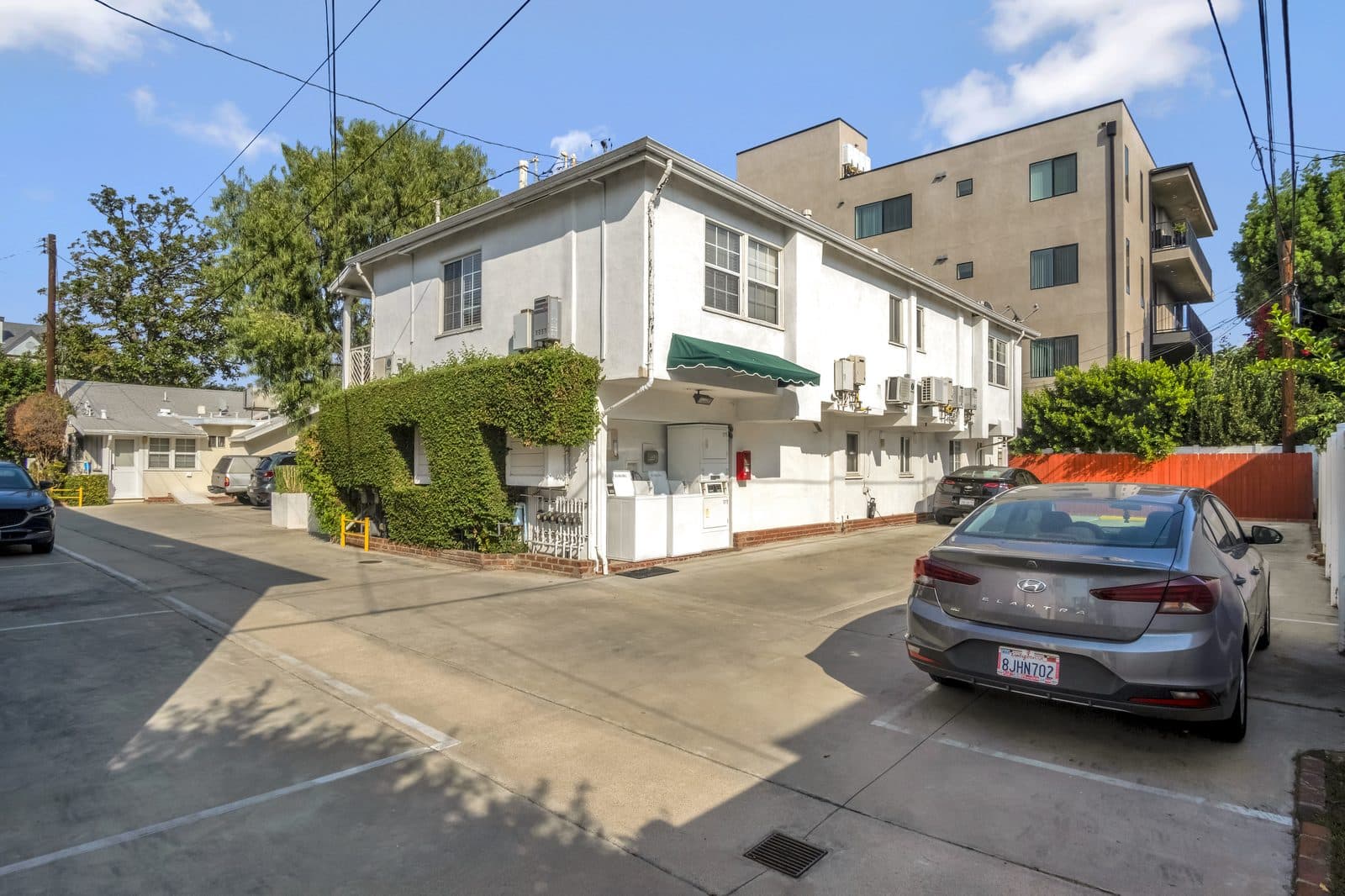 10814 Blix, two-story building with the green awning