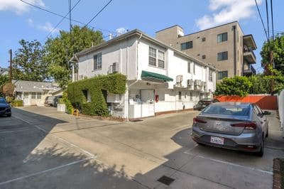 10814 Blix, two-story building with the green awning