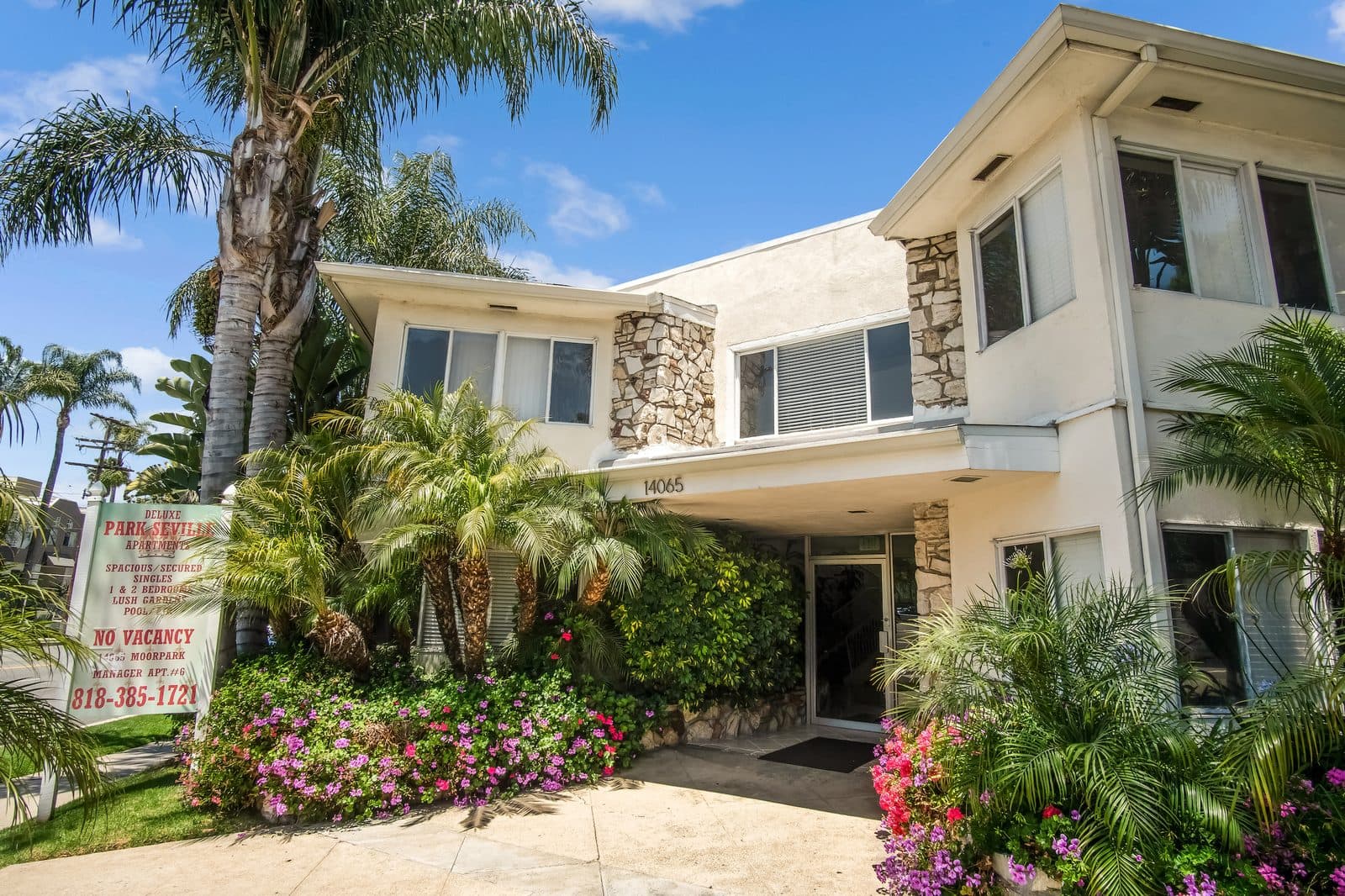 Front entry under the palms on Moorpark St